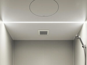 天井から差し込むライン状の光で、洗練されたバスルームに。